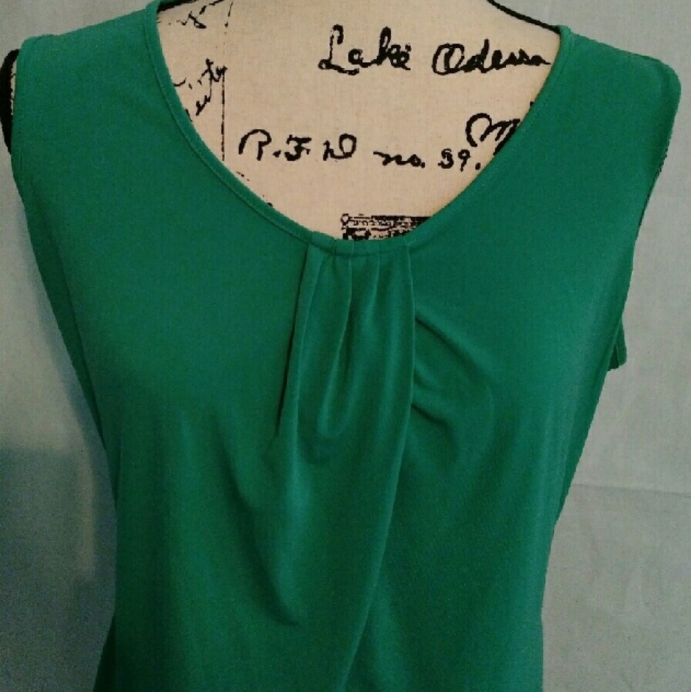 Green sleeveless blouse